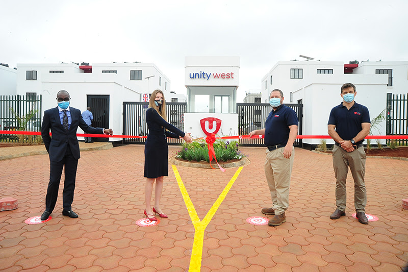 UK High Commissioner presents keys to Unity West owners